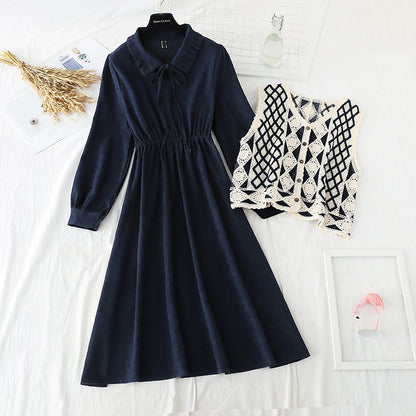 The New Retro waistband is slim, and the two-piece waistcoat skirt is over the knee  2195
