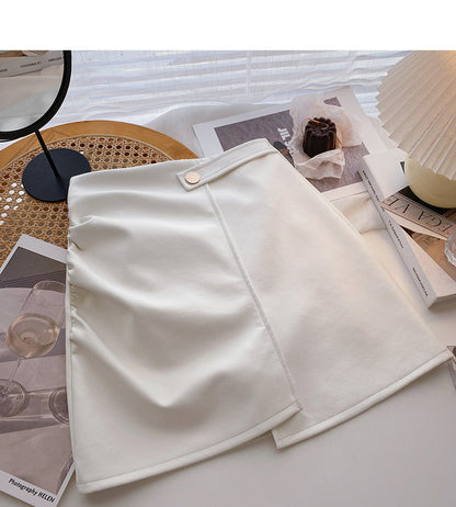 Korean wrinkled Hip Wrap irregular thin high waist A-shaped PU leather skirt  5591