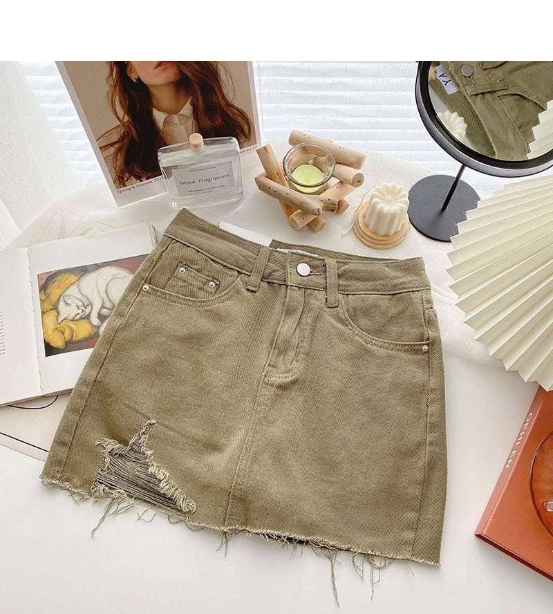 Korean version light proof personalized hole breaking high waist A-shaped skirt  5567
