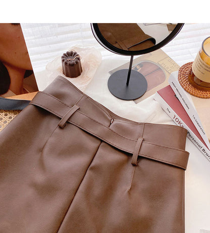 Korean fashion irregular button high waist thin wrap hip leather skirt  5532