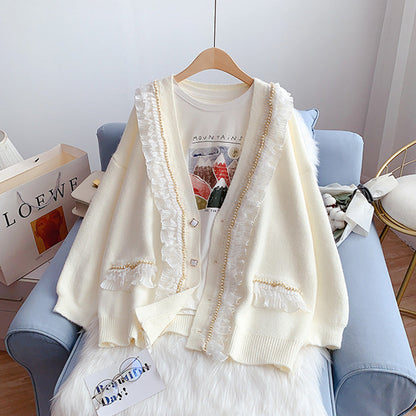 Loose design sense of minority sweet knitted coat  5060