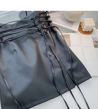 High waist small public design bandage wrap hip thin PU leather skirt  5411