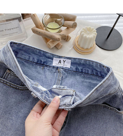 Korean version light proof personalized hole breaking high waist A-shaped skirt  5567