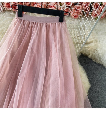 Elastic waist irregular mesh skirt, high waist medium long A-line skirt, fairy skirt shaggy skirt  3525